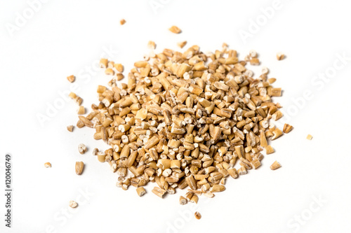 Steel cut oats isolated on white