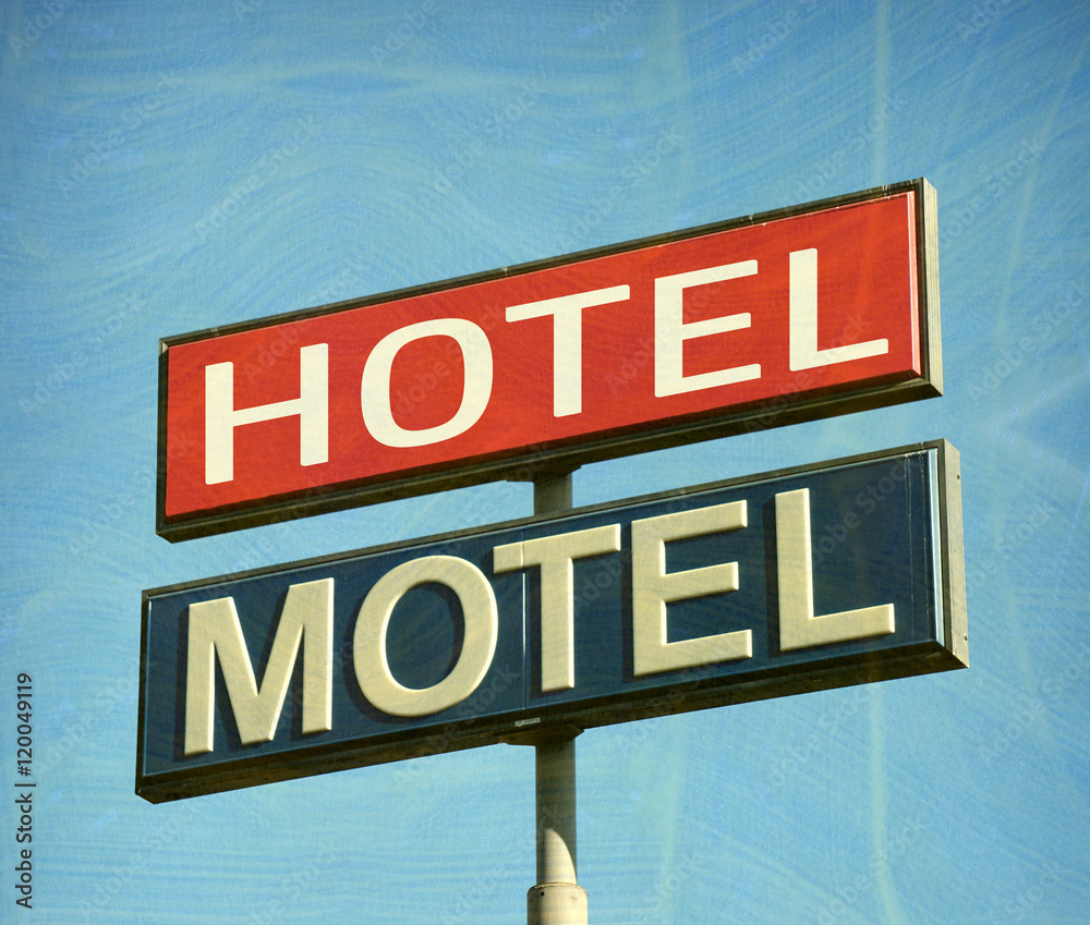 aged and worn vintage hotel motel sign