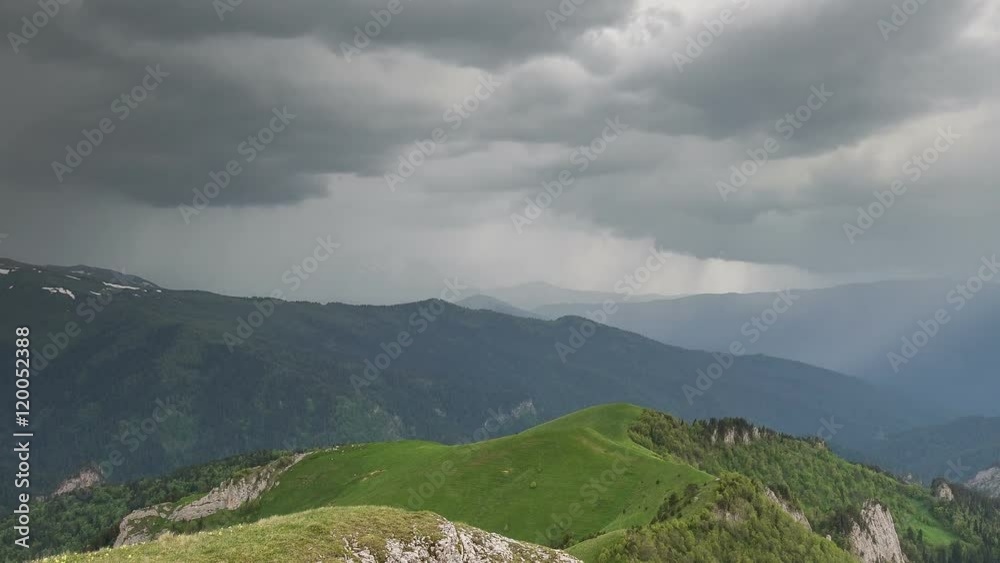 Russia, timelapse. The formation and movement of clouds over the summer slopes of Adygea Bolshoy Thach and the Caucasus Mountains Russia, timelapse. The formation and movement of clouds over the summer slopes of Adygea Bolshoy Thach and the Caucasus Mountains