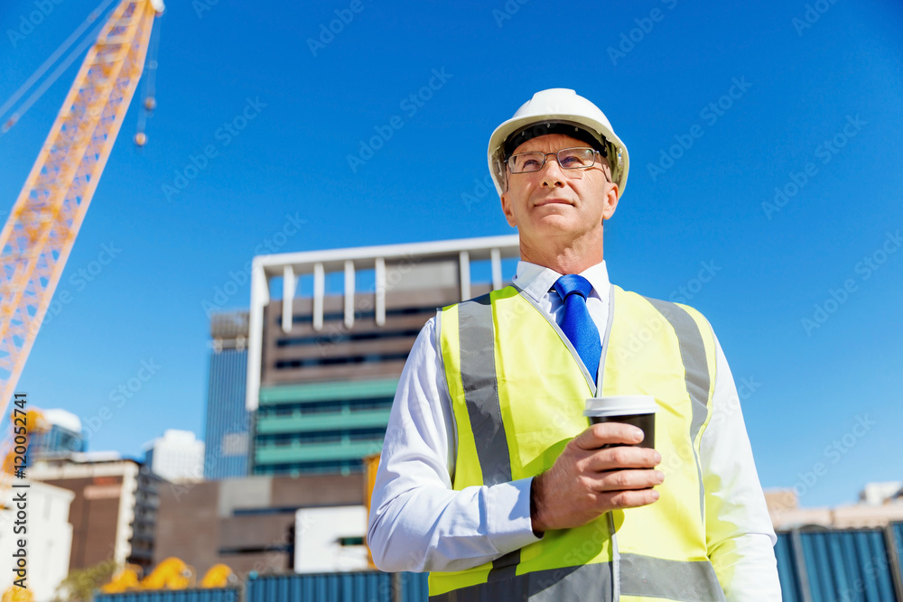 Engineer builder at construction site Engineer builder at construction site