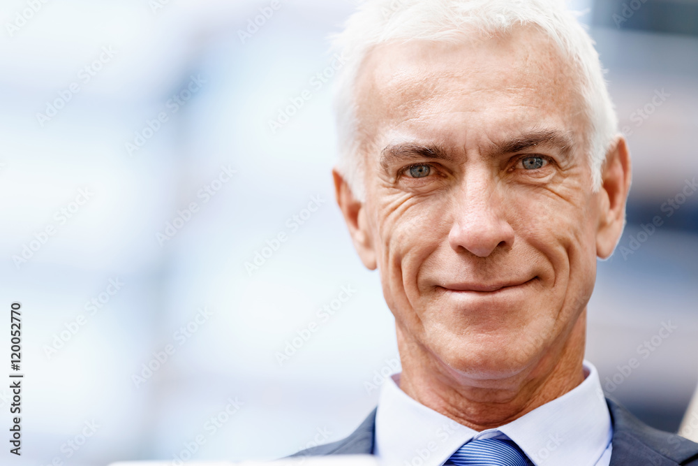 Portrait of confident businessman outdoors