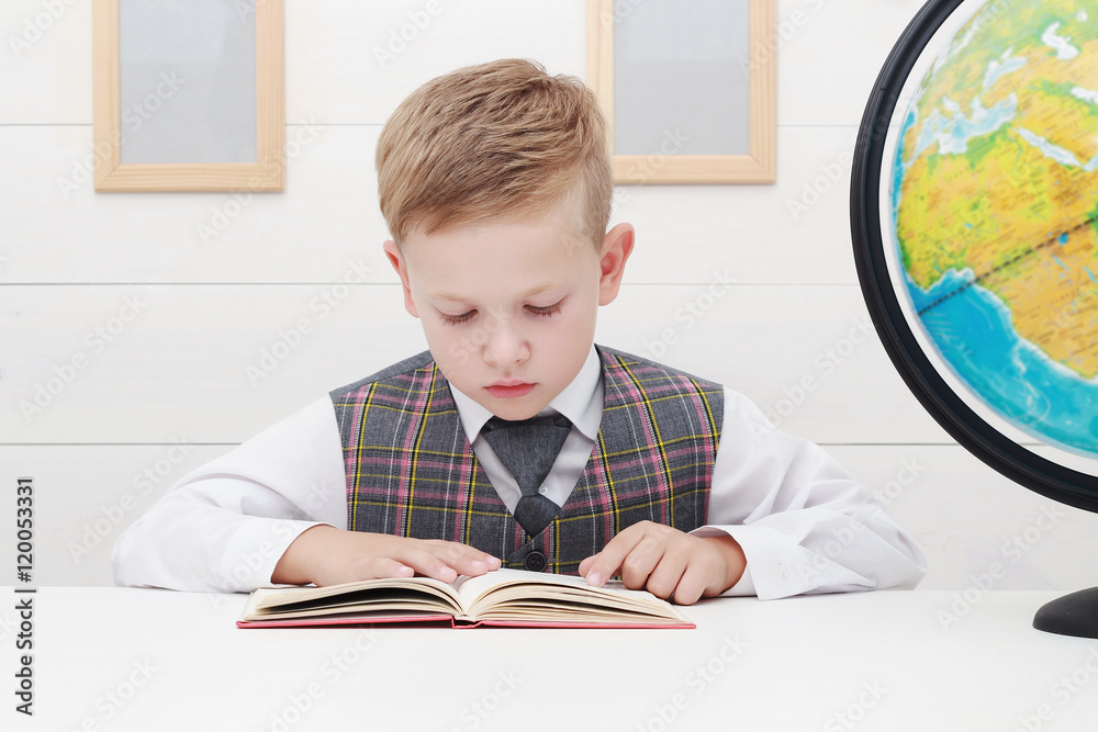 funny Child in school.little boy with Book, Children Education funny Child in school.little boy with Book, Children Education