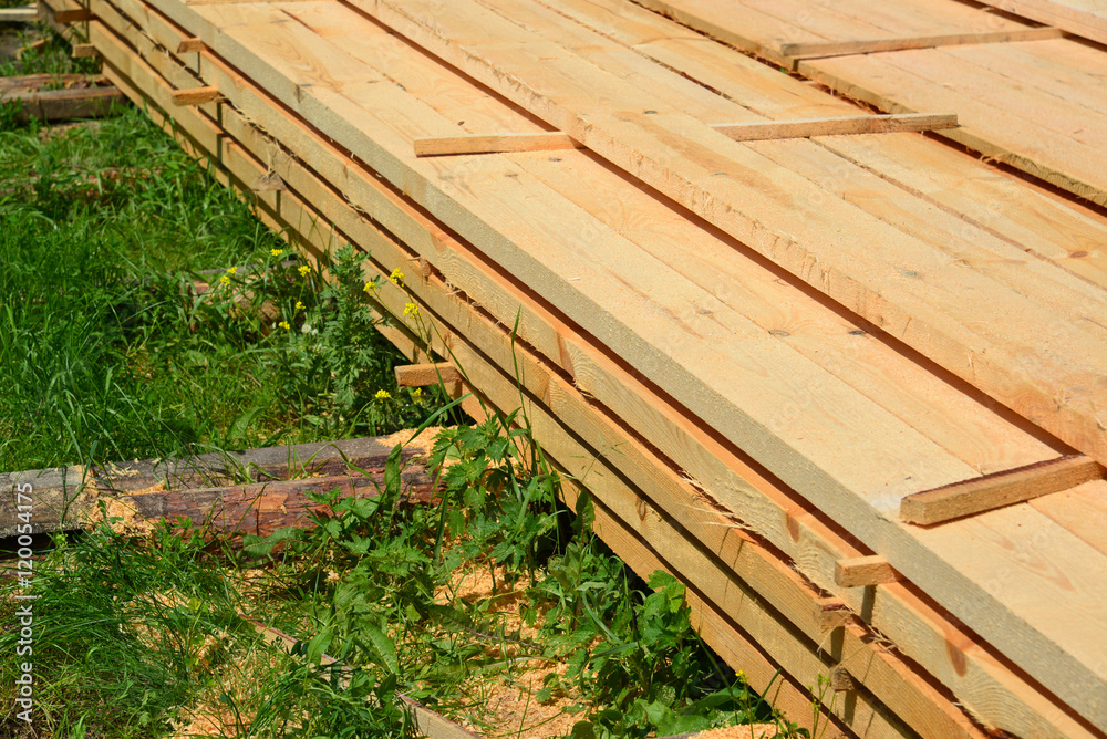 Set of Stacked wood pine timber for construction buildings Set of Stacked wood pine timber for construction buildings