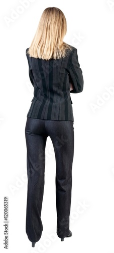 back view of standing beautiful blonde business woman. Young girl in suit. Rear view people collection. backside view of person. Isolated over white background.