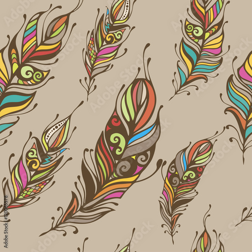 Beautiful hand drawn feathers boho and hippie style seamless pattern background