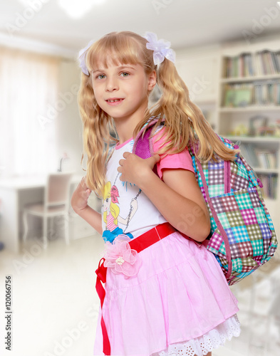 Girl with school backpack