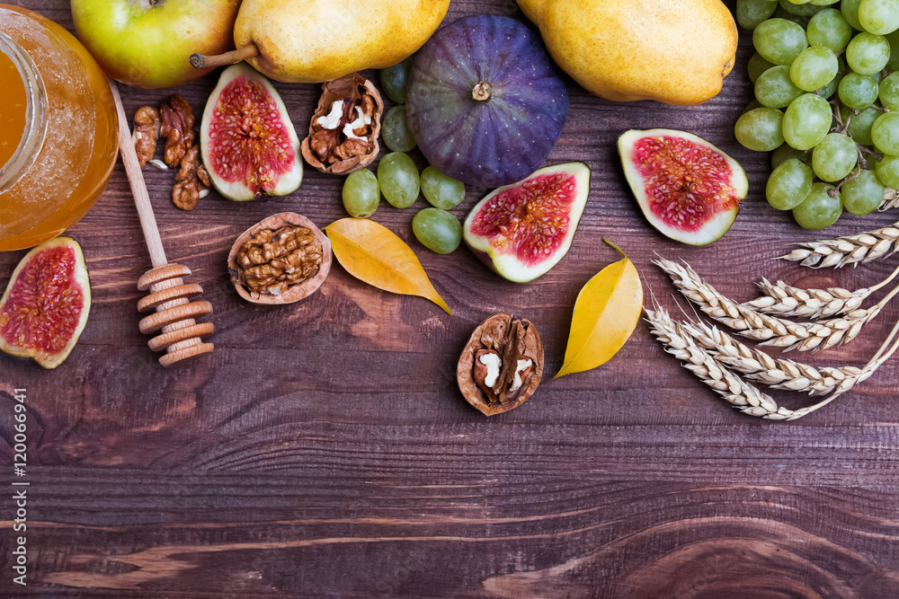 Autumn fruits on wooden table