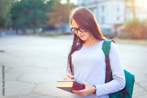 Tableau sur toile A shot of an ethnic college student studying on campus