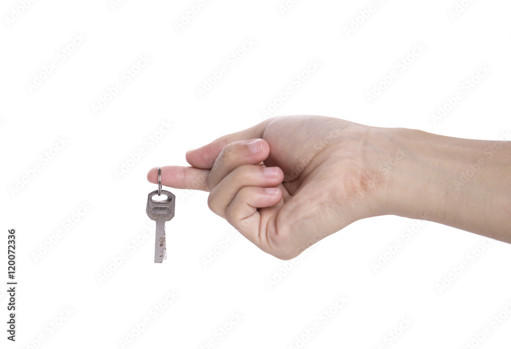 hand holding home key isolated on white background. hand holding home key isolated on white background.