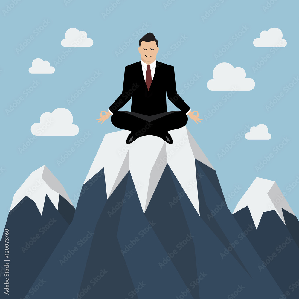 Businessman meditating on a Mountain peak