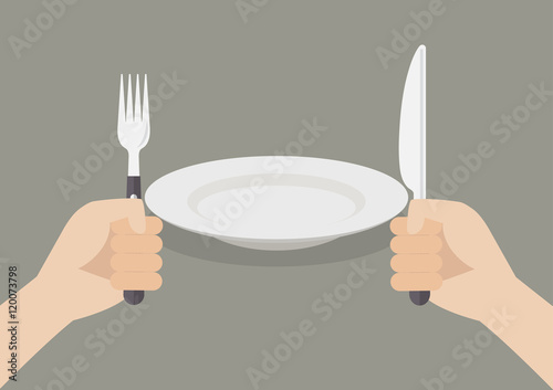 Knife and fork cutlery in hands with white plate