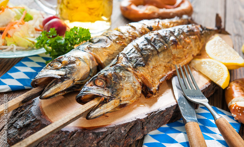 Grilled mackerel fish with beer and pretzel