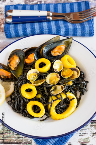 Salad with seaweed and calamary photo