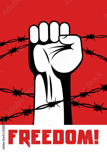 Fist up power. Hand breaks barbed wire. Fight for freedom. Concept of protest, revolution, refugee. Social theme.