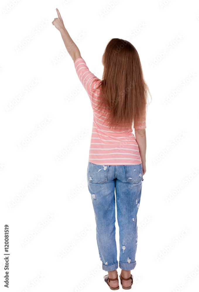 Back view of  pointing woman. beautiful redhaired  girl . girl shows something to someone. Rear view people collection.  backside view of person.  Isolated over white background. Girl in a white T