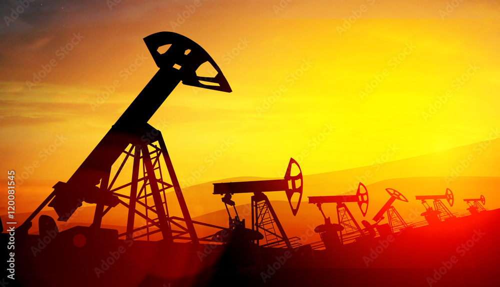 3d illustration of oil pump jacks on sunset background