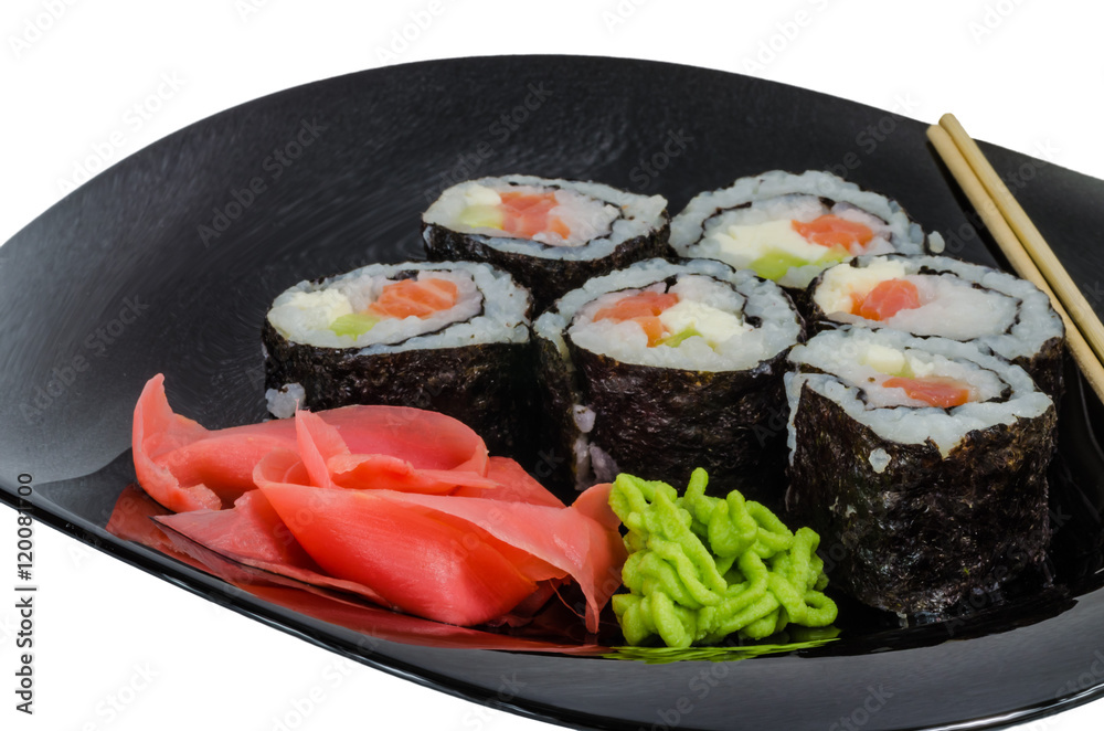Japanese sushi made with rice, fish and seaweed with ginger and wasabi Japanese sushi made with rice, fish and seaweed with ginger and wasabi