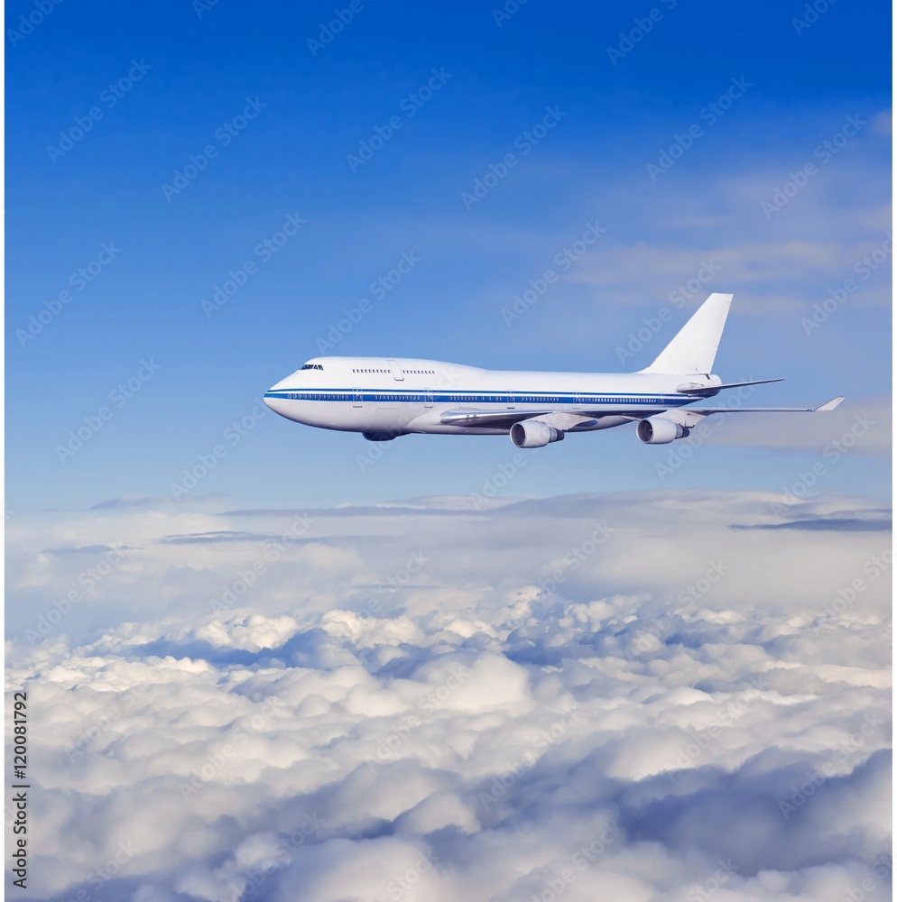Fototapeta passenger airplane in the clouds. travel by air transport. flying to the top of the airliner. nobody