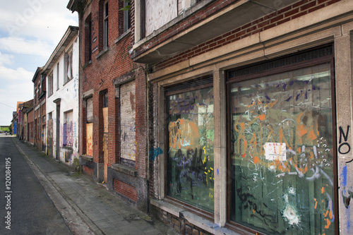 Street in ghost town Doel in Belgium