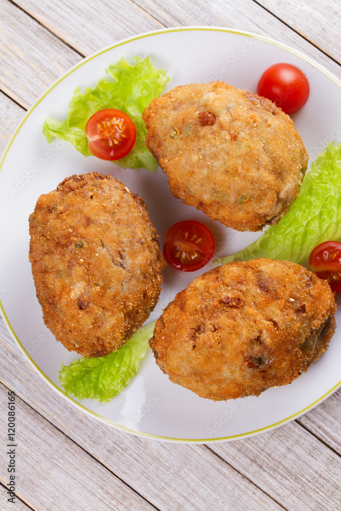 Scotch Eggs Served with Tomato Cherry and Salad on White Plate