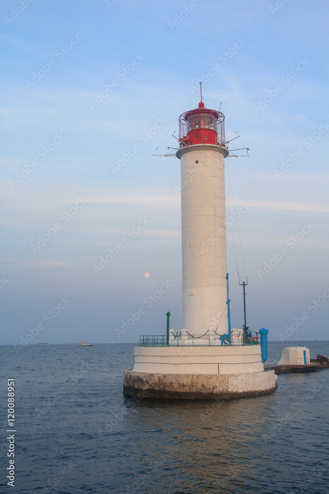 White lighthouse; the sea and coastline. Odessa; Ukraine