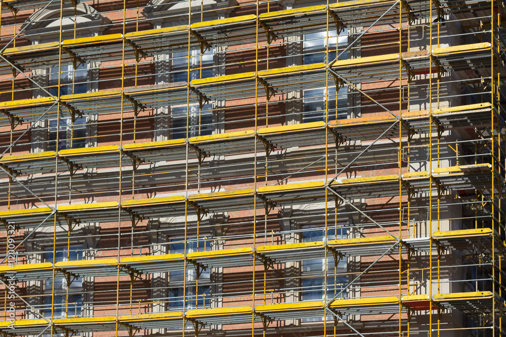 scaffolding on building facade , construction  framework