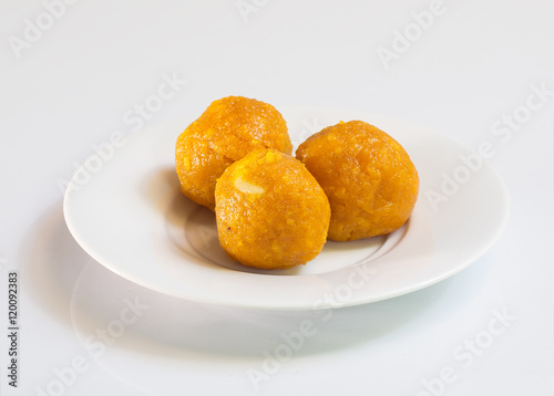 Indian Traditional Diwali sweets called Motichoor Ladoo,on white / Indian dessert
