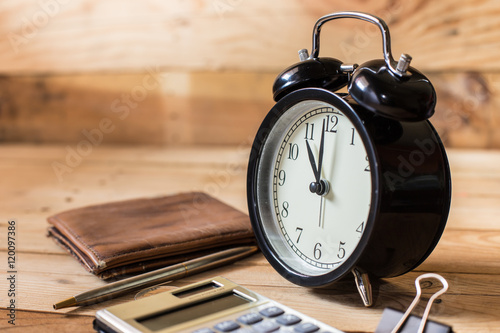alarm clock on wood table background