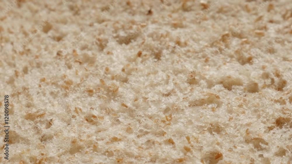 Tilting on whole grain toast bread close-up surface 4K 2160p 30fps UltraHD footage - Rough texture of toasting bread complete food background slow tilt 4K 3840X2160 UHD video Tilting on whole grain toast bread close-up surface 4K 2160p 30fps UltraHD footage - Rough texture of toasting bread complete food background slow tilt 4K 3840X2160 UHD video