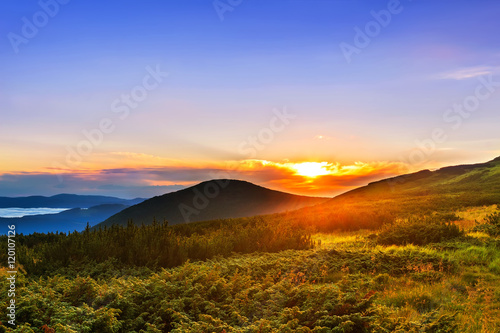 Picturesque sunrise, morning dawn in Carpathian mountains, Ukrai photo