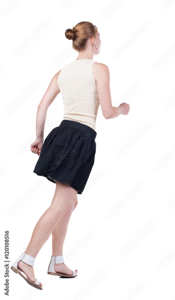 back view of running woman in dress. beautiful blonde girl in motion. backside view of person. Rear view people collection. Isolated over white background. back view of running woman in dress. beautiful blonde girl in motion. backside view of person. Rear view people collection. Isolated over white background.