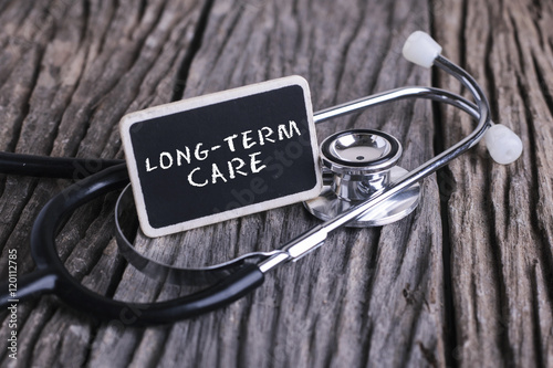 Medicine concept. Blackboard with word LONG TERM CARE
