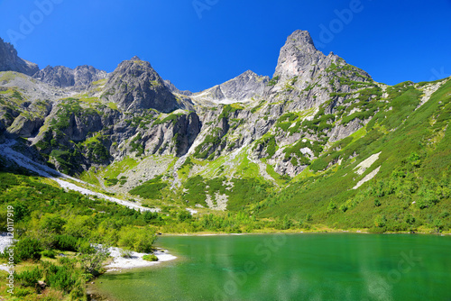 Beautiful summer landscape. Mountain lake Zelene pleso in National Park High Tatra. Slovakia, Europe.