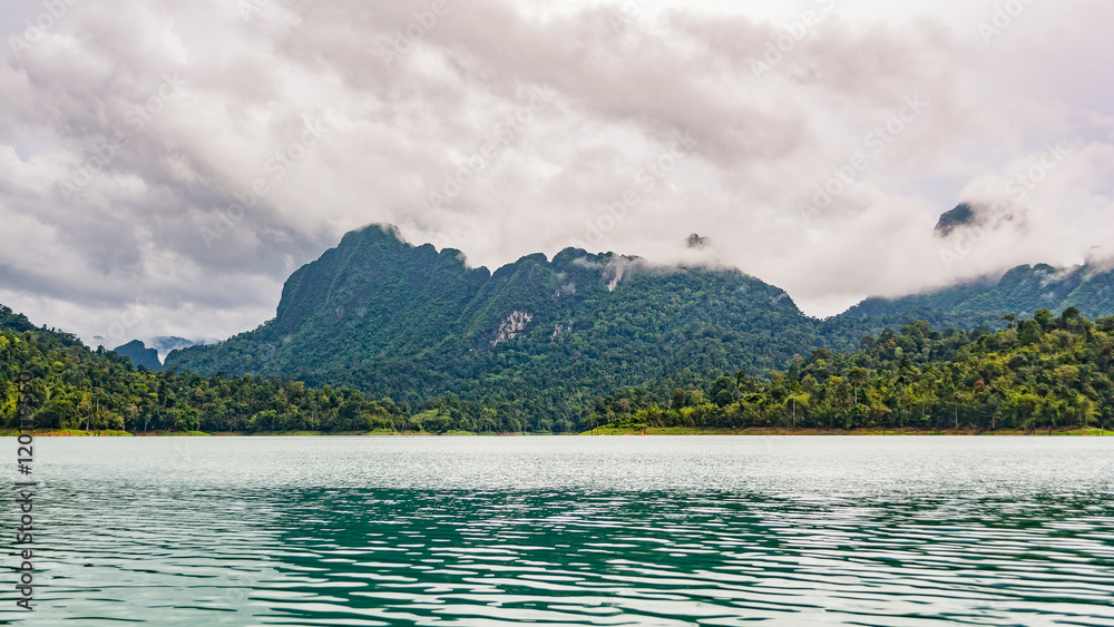 Fototapeta premium Beautiful view of water and mountain at Ratchaprapha dam, Surat