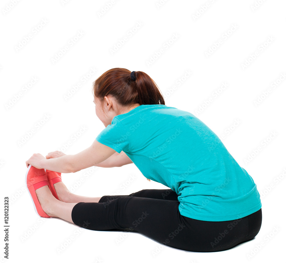Fototapeta premium back view of standing young beautiful woman in sport dress involved in Pilates. Rear view people collection. backside view of person. Isolated over white background. Sport girl in black tights