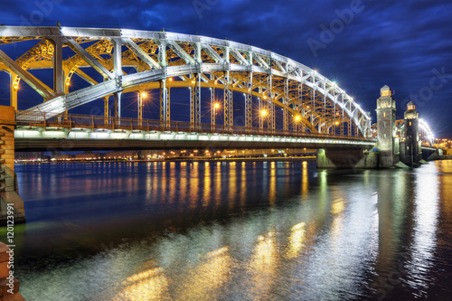 Billede på lærred Bolsheokhtinsky Bridge (before 1917 - Peter the Great Bridge) also known as Okhtinsky Bridge is a bridge across the Neva River in St
