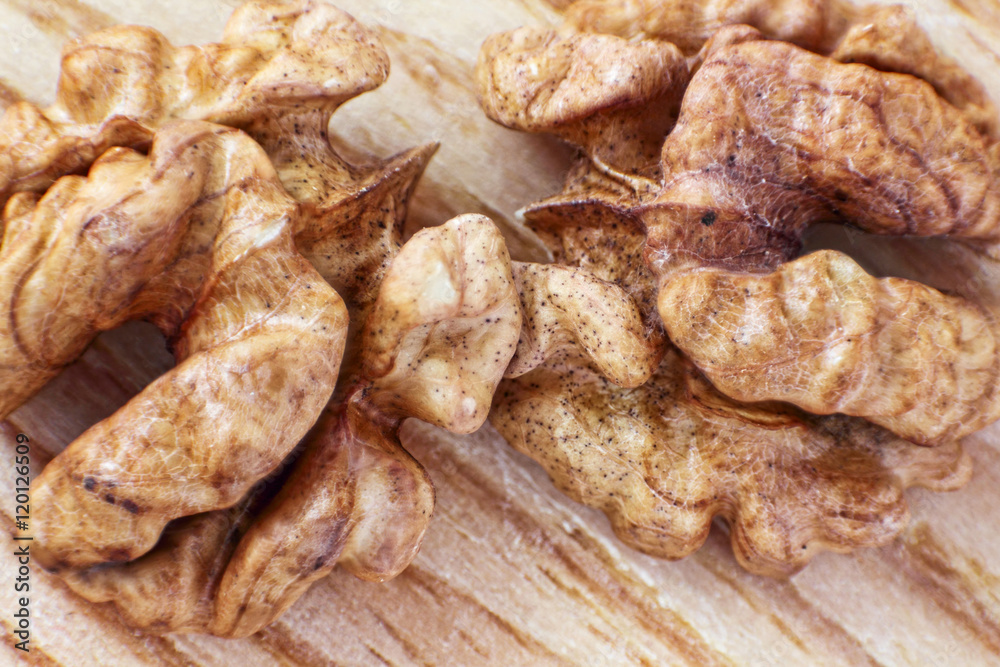 Walnut kernel taken closeup on table. Walnut kernel taken closeup on table.