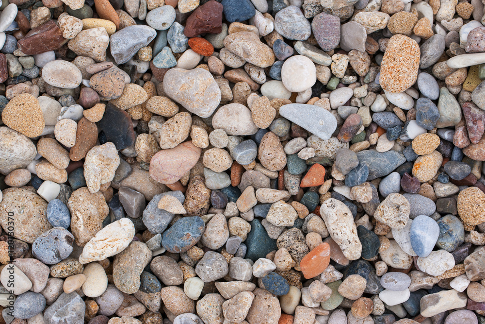 background made of a closeup of a pile of pebbles background made of a closeup of a pile of pebbles