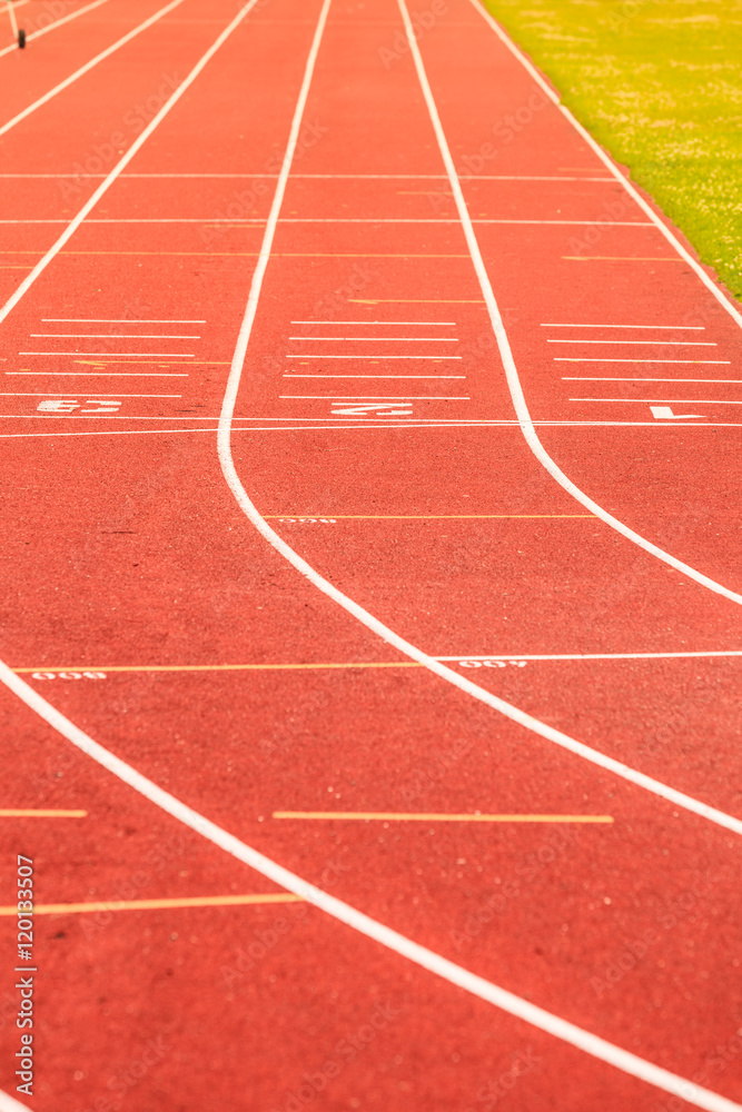Fototapeta premium Red running track in stadium.