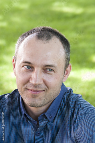 Portrait of a middle-aged man in the park  