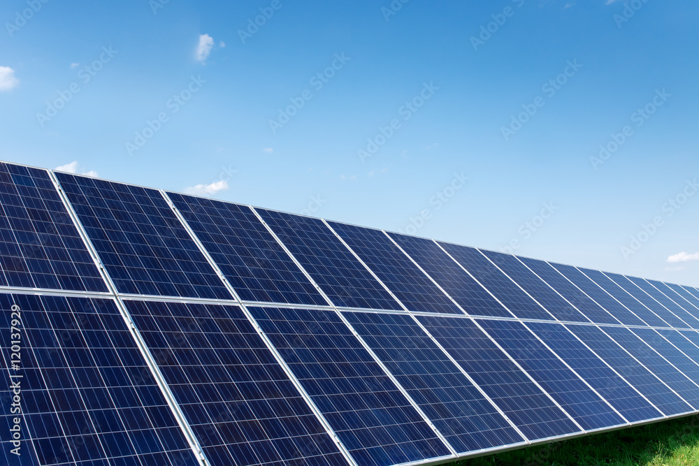 Solar panels generate power energy on blue sky at daytime Solar panels generate power energy on blue sky at daytime