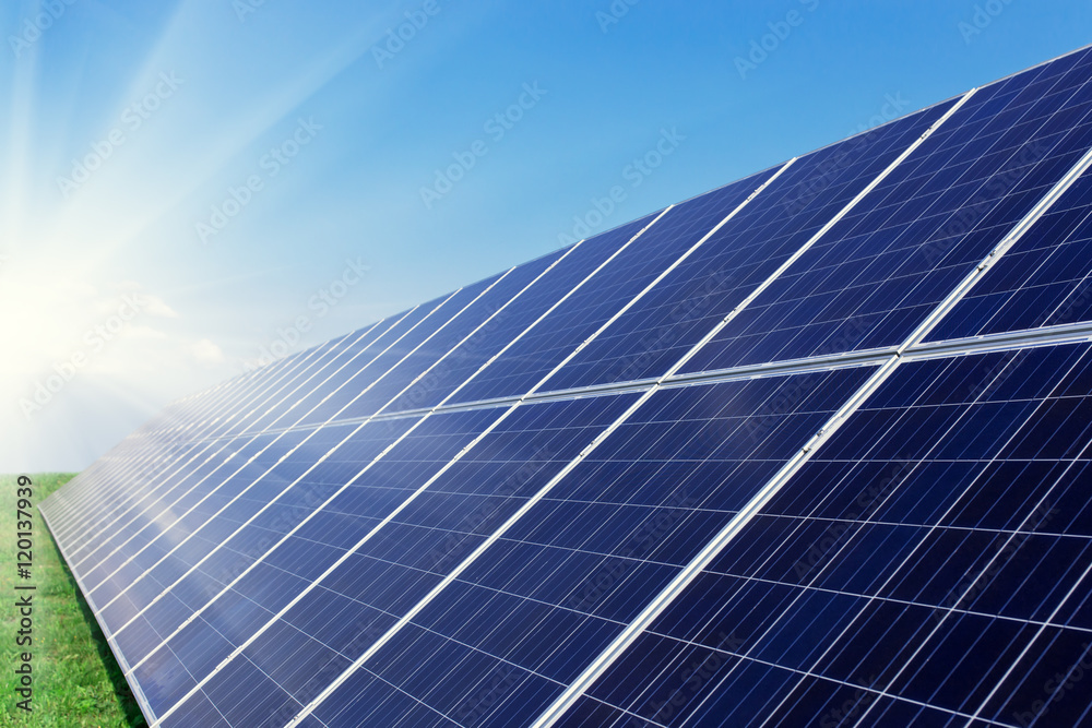 Solar panels generate power energy on blue sky at daytime Solar panels generate power energy on blue sky at daytime