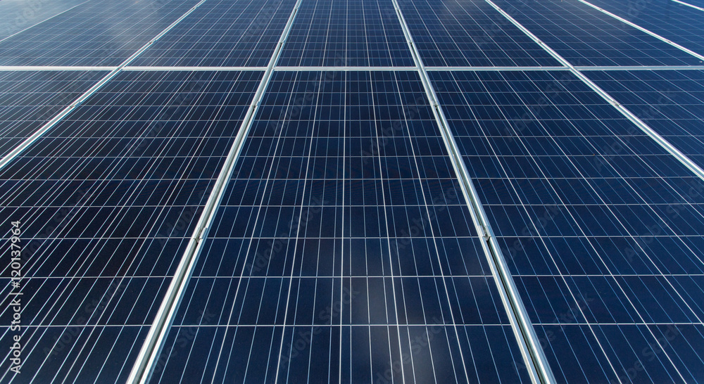 Solar panels generate power energy on blue sky at daytime Solar panels generate power energy on blue sky at daytime