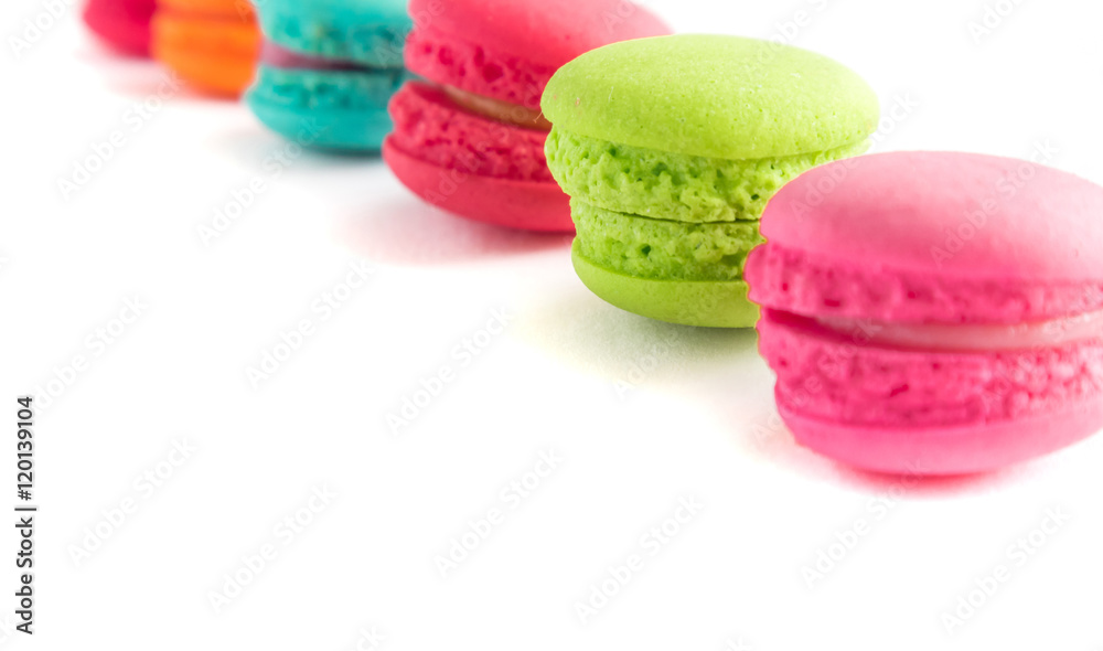 Fototapeta premium French macaroons colorful on white background, sweet and dessert menu