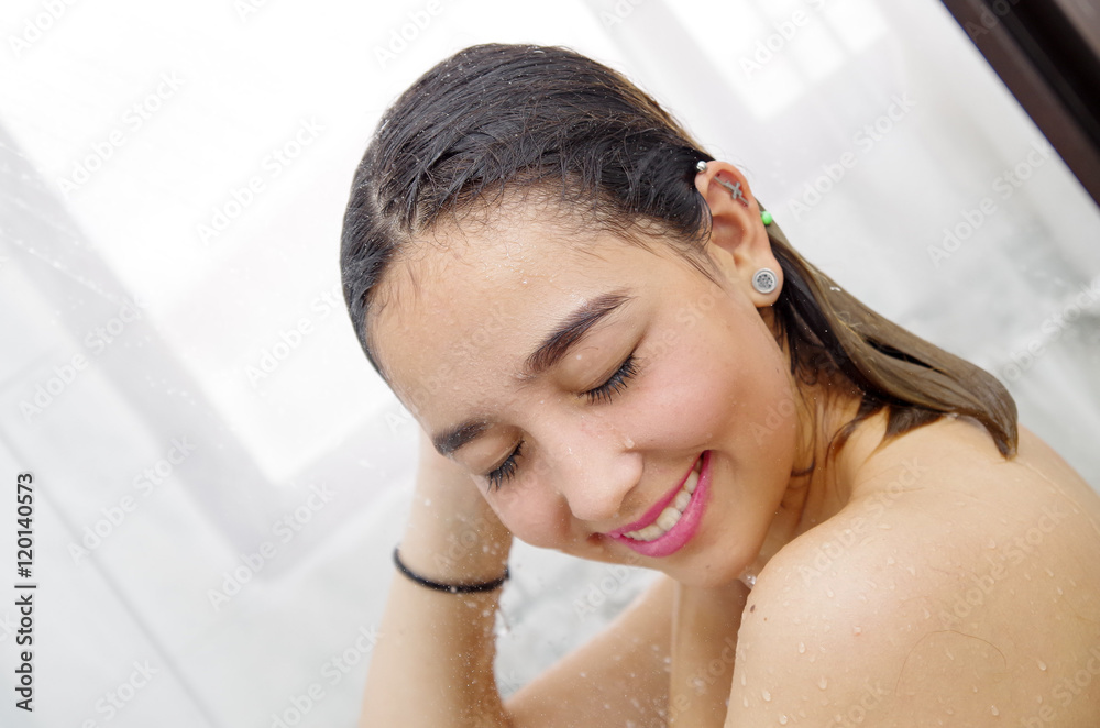 headshot young woman showering headshot young woman showering