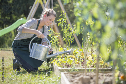 Fotografie Woman in kitchen garden
