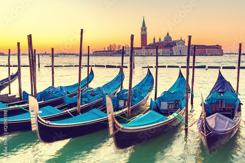 Gondolas in Venice at sunrise © sborisov