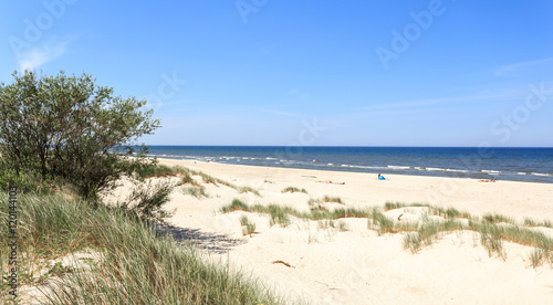 Fototapeta Naklejka Na Ścianę i Meble -  Beach on polish coast of Baltic Sea in middle of  holiday season - around Rowy, between Ustka and Leba