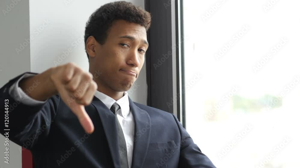Thumbs Down By Upset Businessman Thumbs Down By Upset Businessman