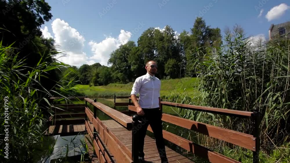 groom walking in nature groom walking in nature